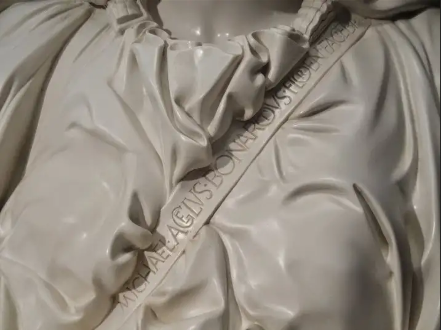 The only signature we have for any work of Michelangelo, right across the chest of the Madonna.