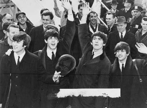  The Beatles arrive at JFK airport, 1964 (from Wikimedia Commons).
