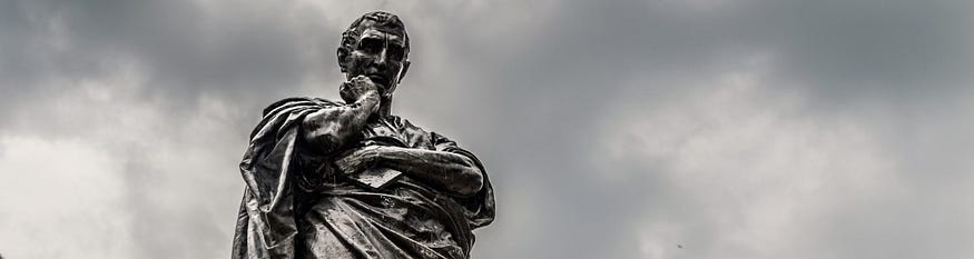 The statue of Ovid in Constanta, showing the dour exile who pined away under the gray skies of Romania. (From https://bdmundo.bg/bg/-statuya-ovidiya/)
