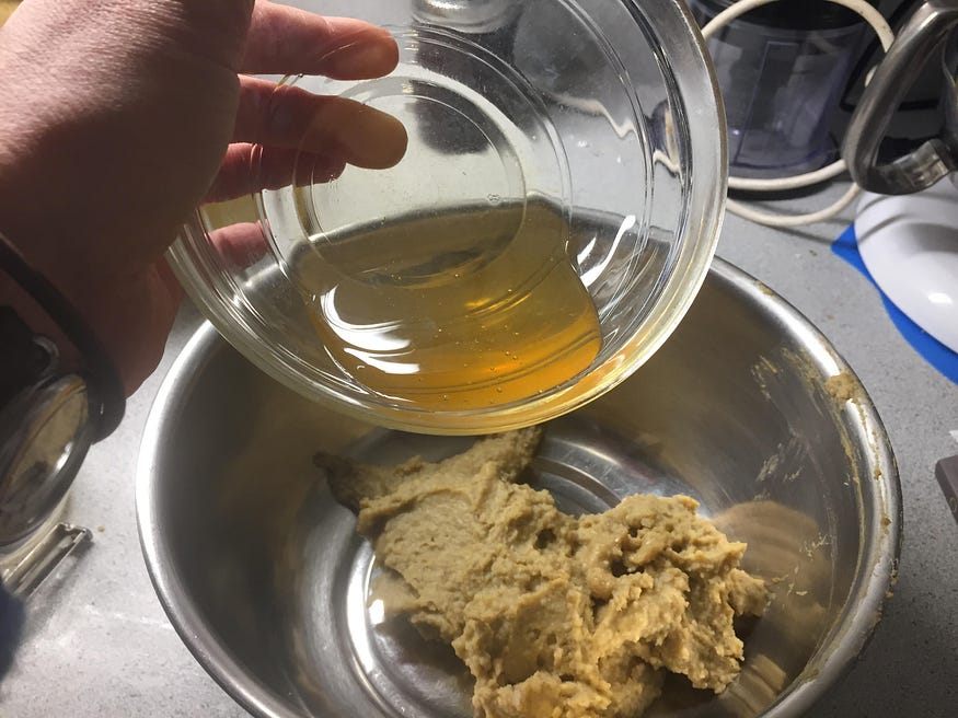 In goes the honey.
