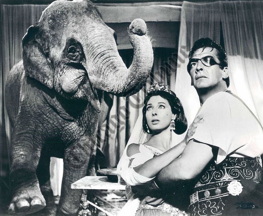  Rita Gam with Victor Mature (right) and an unidentified extra in the 1959 epic ‘Hannibal.’