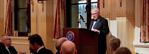  Michael Putnam speaking after receiving the Arete Award at the 2019 Paideia Gala.
