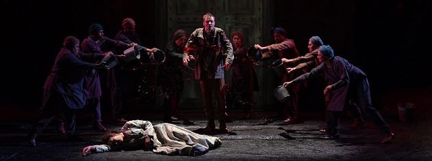  Orestes the matricide (Josiah Bania), with chorus, in the Shakespeare Theatre production in D.C. (photo by Scott Suchman)
